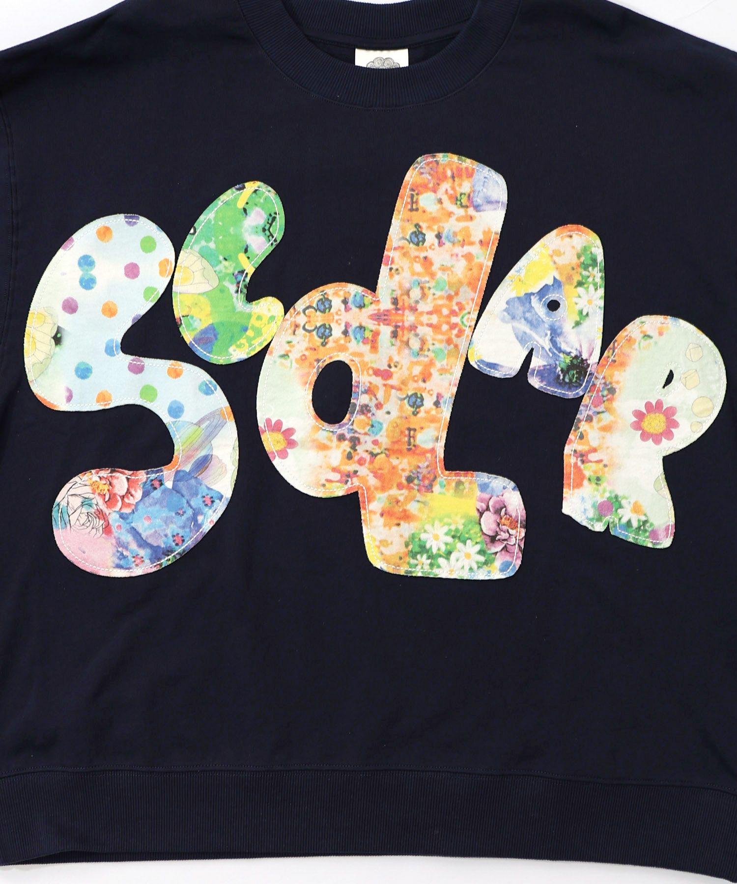 161618：スカラー総柄ロゴアップリケ裏毛プルオーバーの通販-ScoLar